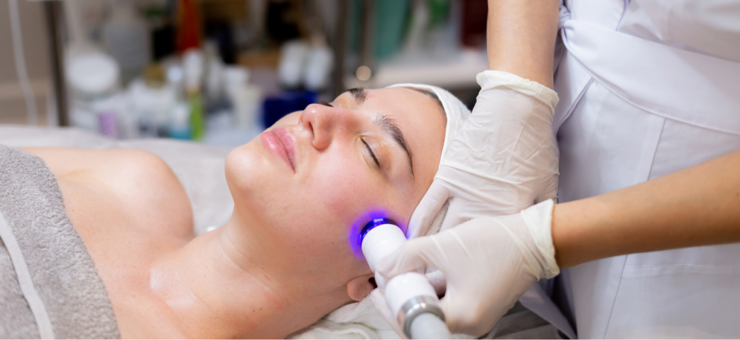 Woman receiving a laser skin treatment.